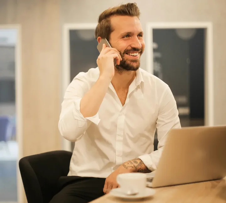 Recruitment professional coordinating a hire by phone